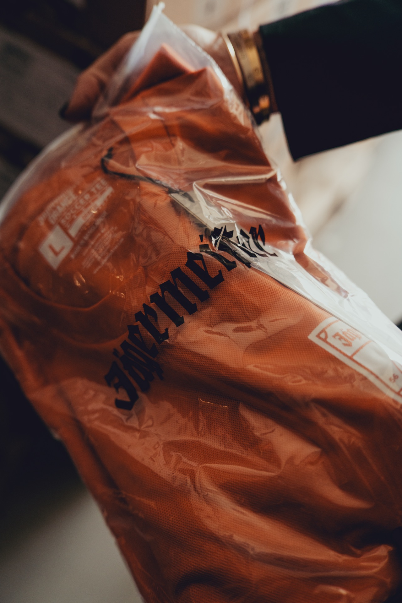 Jägermeister orange shirt sealed in branded poly bag
