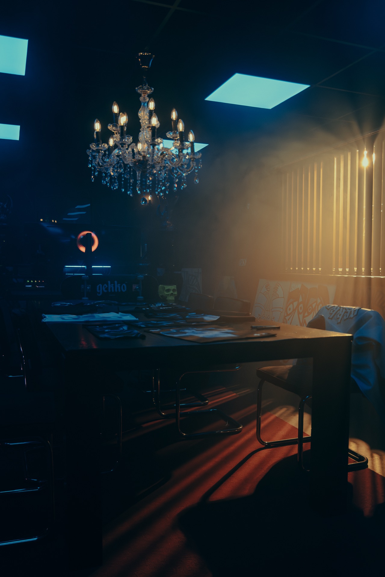 GEKKO office — chandelier above the design desk
