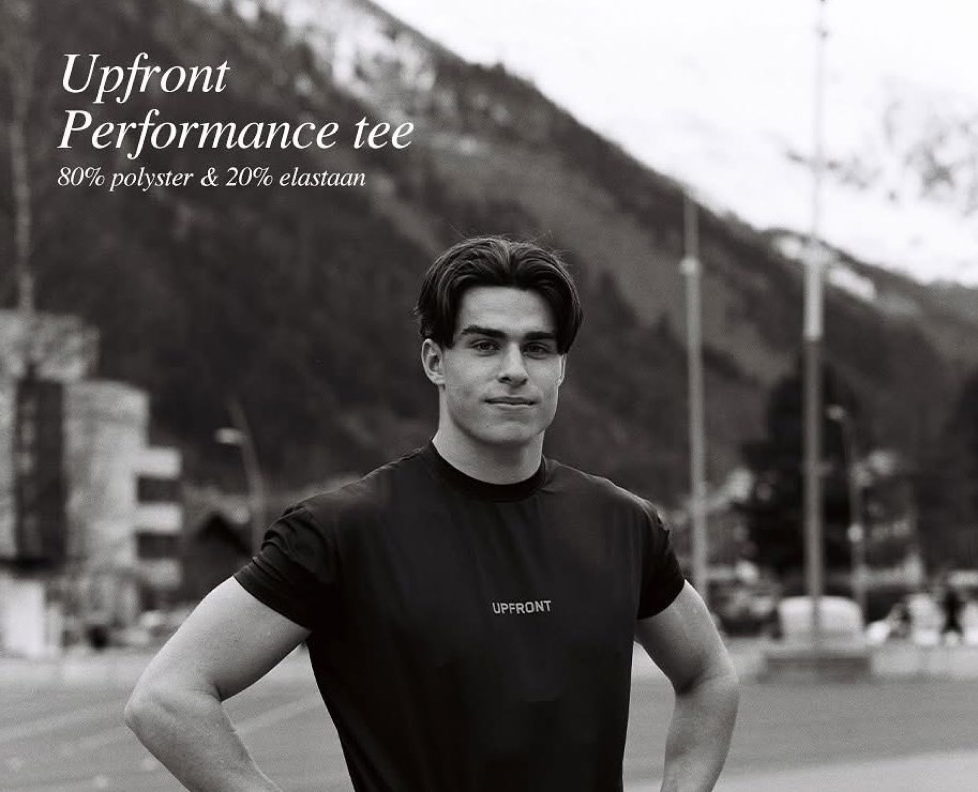 Upfront Performance Tee model in mountain town