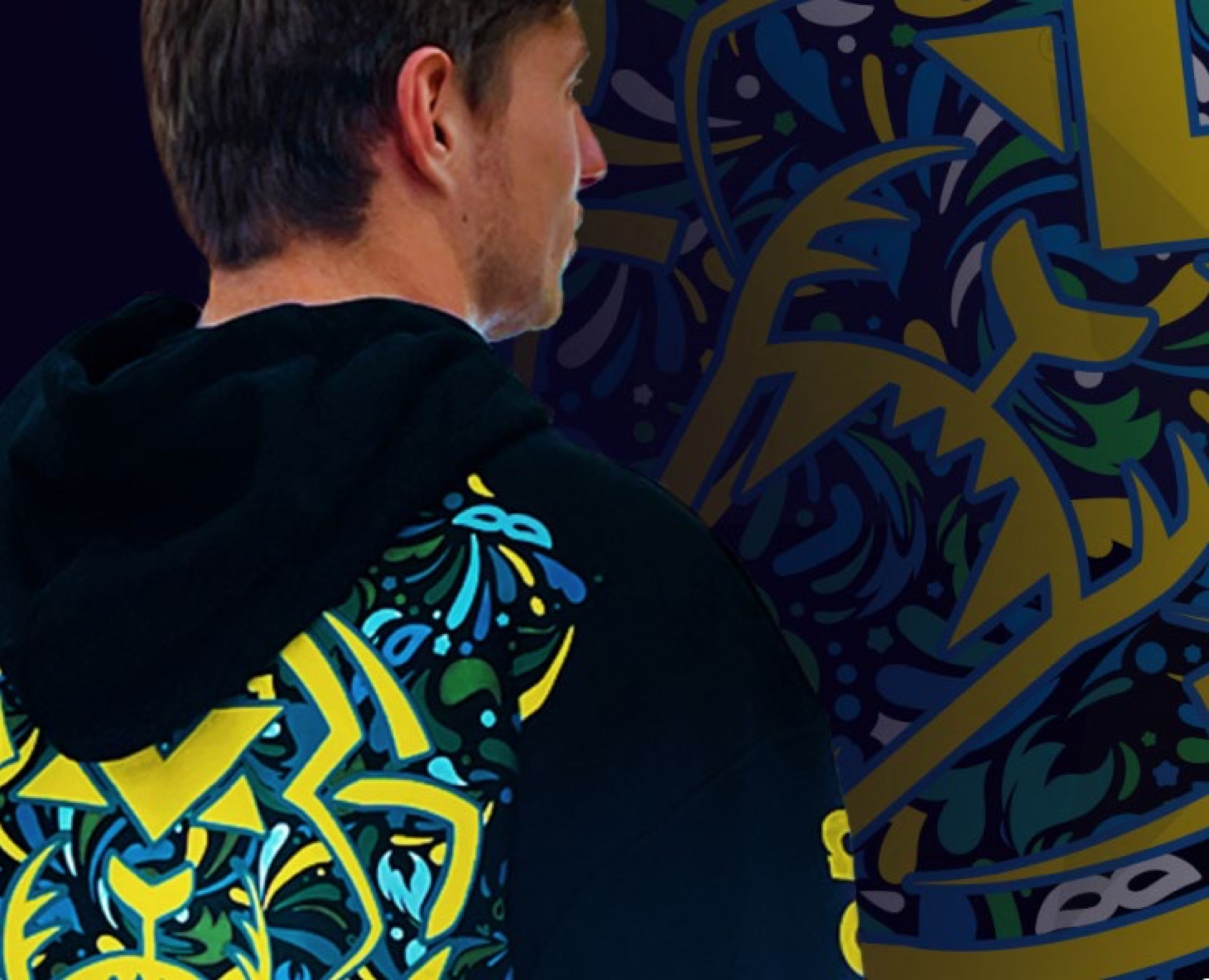 Race-specific hood with ornate helmet graphic